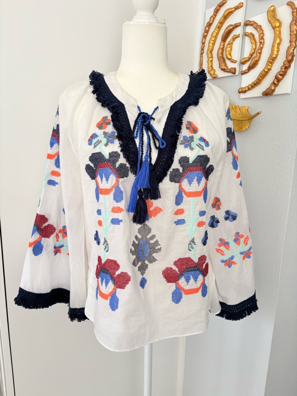 Stellah White Embroidered Peasant Blouse with Navy Trim and Tassels